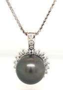 14kt White gold 12mm Tahitian pearl and diamond halo pendant on chain