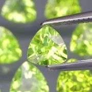 Glittering! Untreated 5.38ct 5x5mm trillion cut Peridot set!