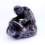 Incredible 131.71ct Tanzanian Black Sapphire carving!