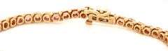14kt Yellow gold pink sapphire and diamond tennis bracelet