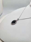 8.71ctw Star Blue Sapphire Cabochon with Natural Diamond Halo – Oval Cut Elegance pendent
