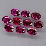 Amazing 9.80ct oval cut violet Garnet set