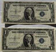 Two 1935 E $1 Consecutive Unc Silver Certificates.