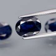 Beautifully colored 3.82ct ink blue Sapphire set