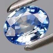 VS grade! Solitaire sized! .57ct bi-color Ceylon Sapphire! Heated only!