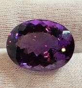 Halo flashing 24.55ct real unheated Bolivian Amethyst