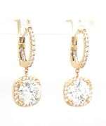2.10ctw round brilliant cut Lab grown diamond in 0.16ctw huggie hoop