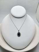 8.71ctw Star Blue Sapphire Cabochon with Natural Diamond Halo – Oval Cut Elegance pendent