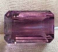 Emerald cut! 35.03ct electric flashing Amethyst