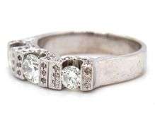 14kt White gold 0.85ctw 3 stone diamond ring