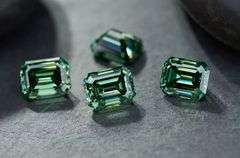 Sparkling 2.5 Cttw 4 Piece Set of Near Flawless Emerald Cut Green Fire Moissanites