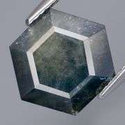 Huge! 10.39ct gray green Sapphire with plenty of silver shimmer!