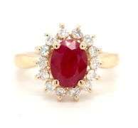 14kt Yellow gold oval lead treated ruby and diamond halo ring