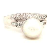 18kt White gold 10mm pearl and channel set baguette and diamond pave abstract ring