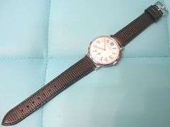 CONTENT OF SAFE DEPOSIT BOX: RARE GIRARD PERREGAUX ART DECO MEN'S WATCH