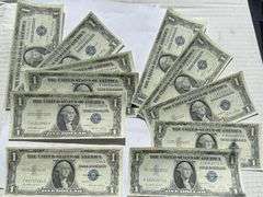 Ten 1935 E Slider $1 Silver Certificates..