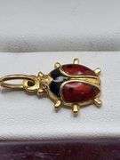 18k gold pendent, lady bug.