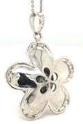 14kt White gold 10x10.5 Tahitian pearl and diamond flower pendant on chain