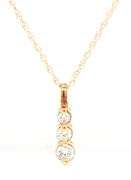 14kt Yellow gold 0.15ctw diamond graduated 3 stone pendant on chain