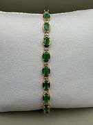 14K Yellow Gold Oval Cut Emerald Tennis Bracelet