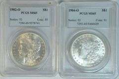 Solid bright-white pair of PCGS MS65 graded Morgans from 1902-O & 1904-O