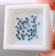 High fire! .66ct set of round brilliant cut Diamonds