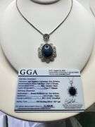 Very large 35.5ctw Star Blue Sapphire Cabochon with Natural Diamond Halo – Oval Cut Elegance pendent