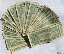 Twenty Five 1957 Series $1 Silver Certificates