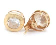 3 Pairs of 14kt yellow gold CZ stud earrings