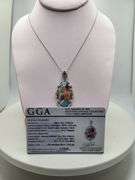 Very rare and collectable 19.62 ctw opal and diamond pendent