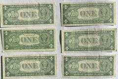 Six $1 1935 E Near Unc Silver Certificates.