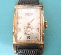 CONTENT OF SAFE DEPOSIT BOX: GRUEN CURVEX MEN'S WATCH WITH FANCY CRYSTAL