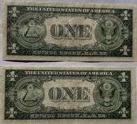 Two 1935 E $1 Consecutive Unc Silver Certificates.