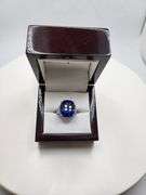 Magnificent 18 ctw sapphire lab grown v, very fine quality with natural diamond set in silver ring