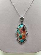 Very rare and collectable 19.62 ctw opal and diamond pendent