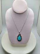 Magnificent 10.8ctw turquise with ruby and diamond pendent set in Silver – CGA Certified