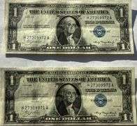 Two $1 Consecutive 1935 A sLIDER Unc Silver Certificates