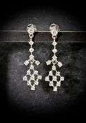 Feminine 14K White Gold Diamond Dangle Earrings