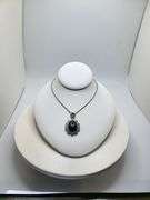 Very large 35.5ctw Star Blue Sapphire Cabochon with Natural Diamond Halo – Oval Cut Elegance pendent