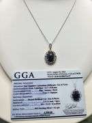 8.71ctw Star Blue Sapphire Cabochon with Natural Diamond Halo – Oval Cut Elegance pendent
