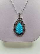 Magnificent 10.8ctw turquise with ruby and diamond pendent set in Silver – CGA Certified