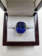 Magnificent 18 ctw sapphire lab grown v, very fine quality with natural diamond set in silver ring