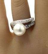 18kt White gold 10mm pearl and channel set baguette and diamond pave abstract ring