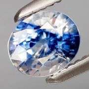 VS grade! Solitaire sized! .72ct bi-color Ceylon Sapphire! Heated only!