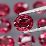 Lovely 6.08ct oval cut cherry red Rhodolite Garnet set
