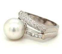 18kt White gold 10mm pearl and channel set baguette and diamond pave abstract ring