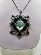 Very rare and collectable 26.14 ctw onyx, sapphire, ruby, emerald pendent
