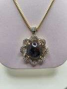Very large 35.5ctw Cabochon ruby with Natural sapphire Halo – Oval Cut Elegance pendent