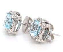 14kt White gold blue topaz and diamond earrings