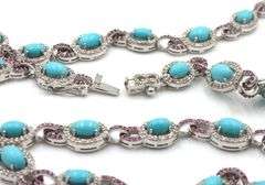 Inspiring 21.15CTW Oval Cabochon-Cut Turquoise, 4.25CTW Single Cut Faceted Rubies & 4.25CTW Diamond 